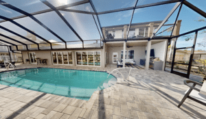 Indoor pool with glass walls and ceiling